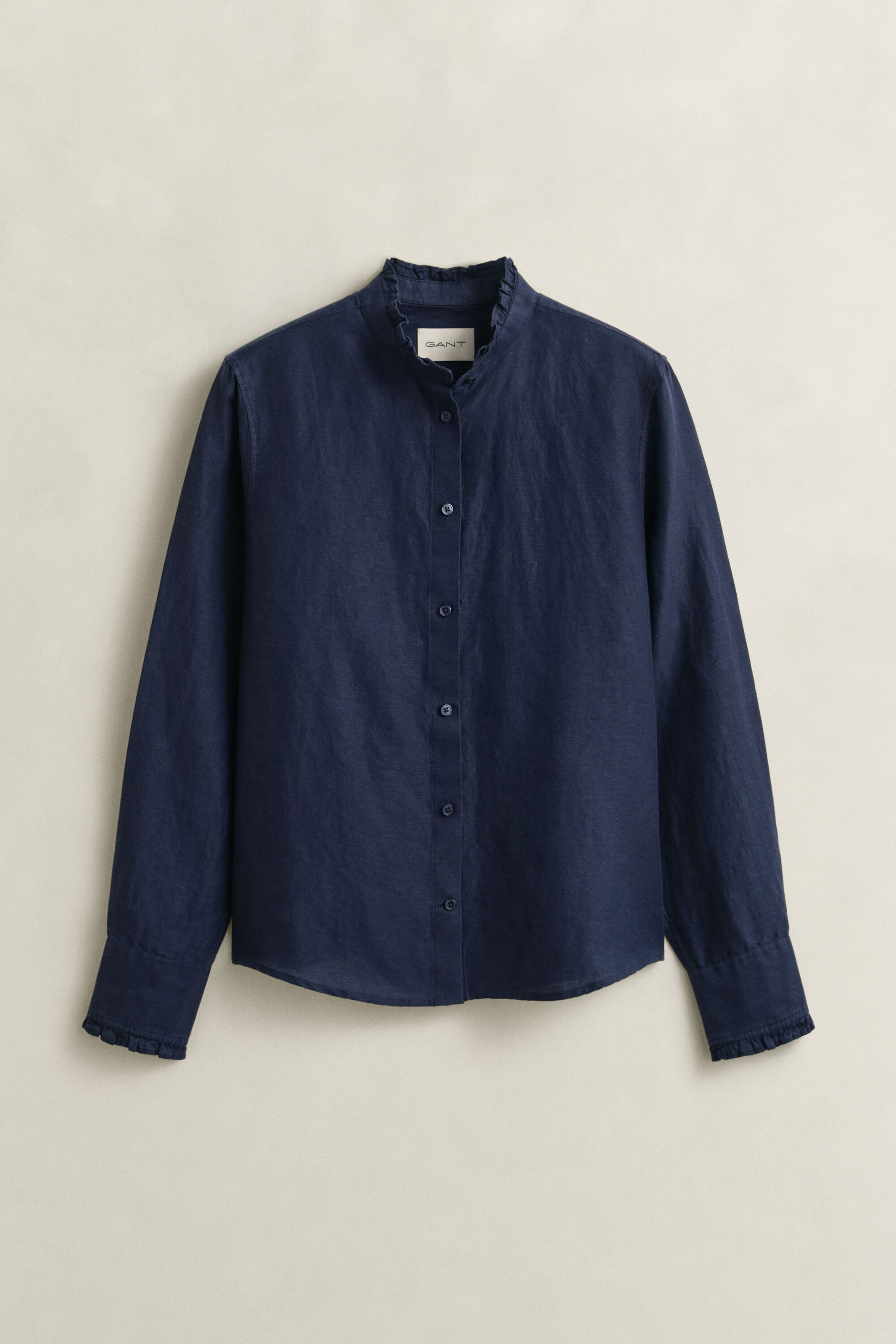 Blus i linneblandning med volang