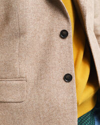 Kostymkavaj med fiskbensmönster