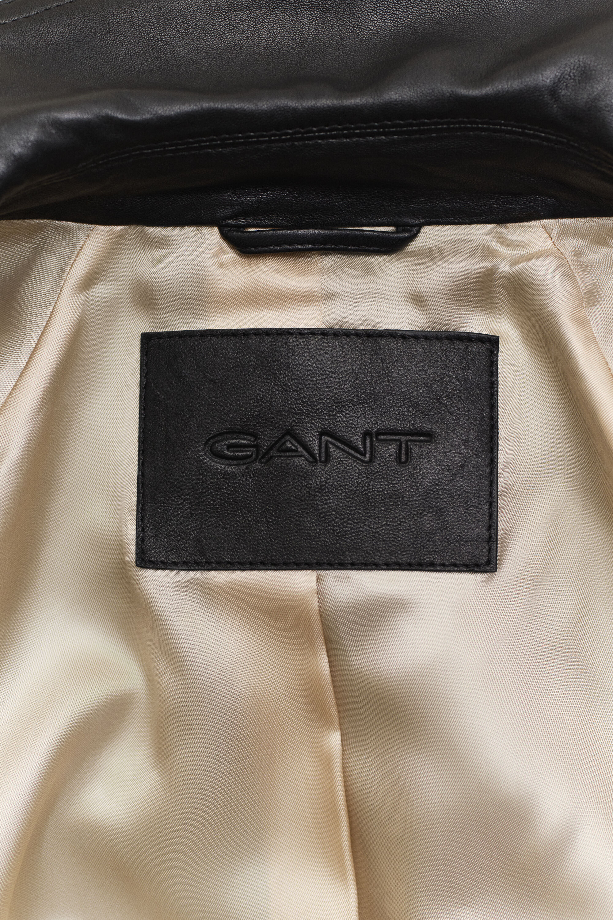 Kort trenchcoat i läder