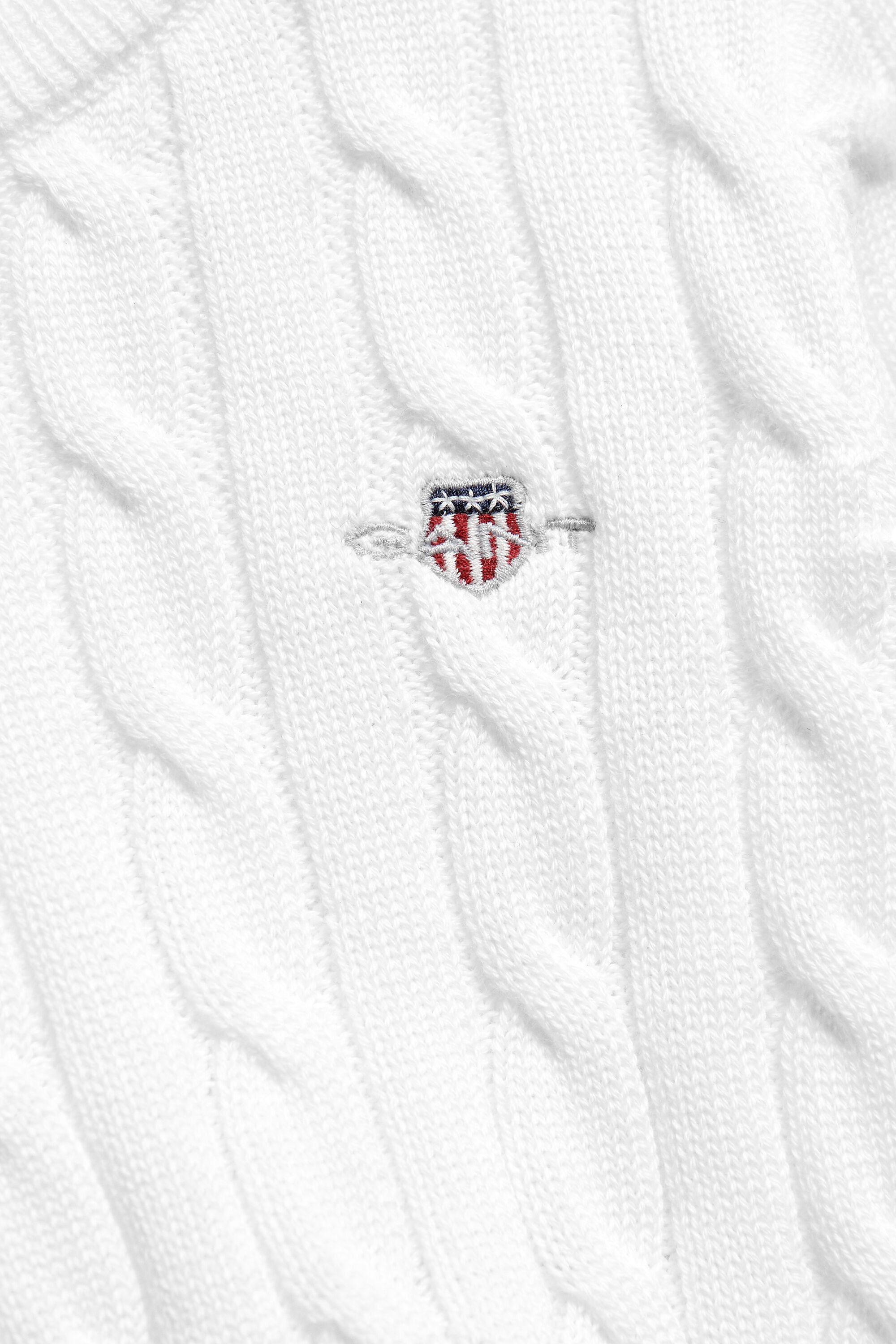 Girls kabelstickad tröja med sköldemblem