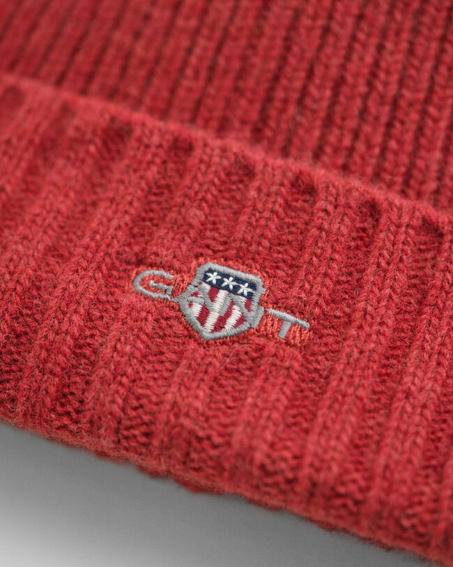 Yllemössa med sköld