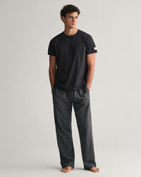 Presentf&ouml;rpackning med pyjamasbyxor och T-shirt i flanell