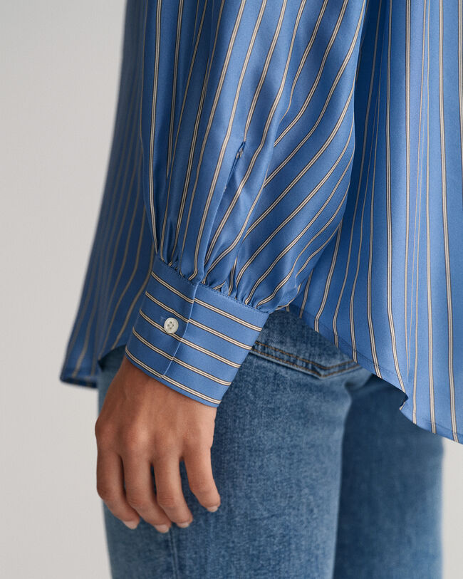 Randig knytblus i siden