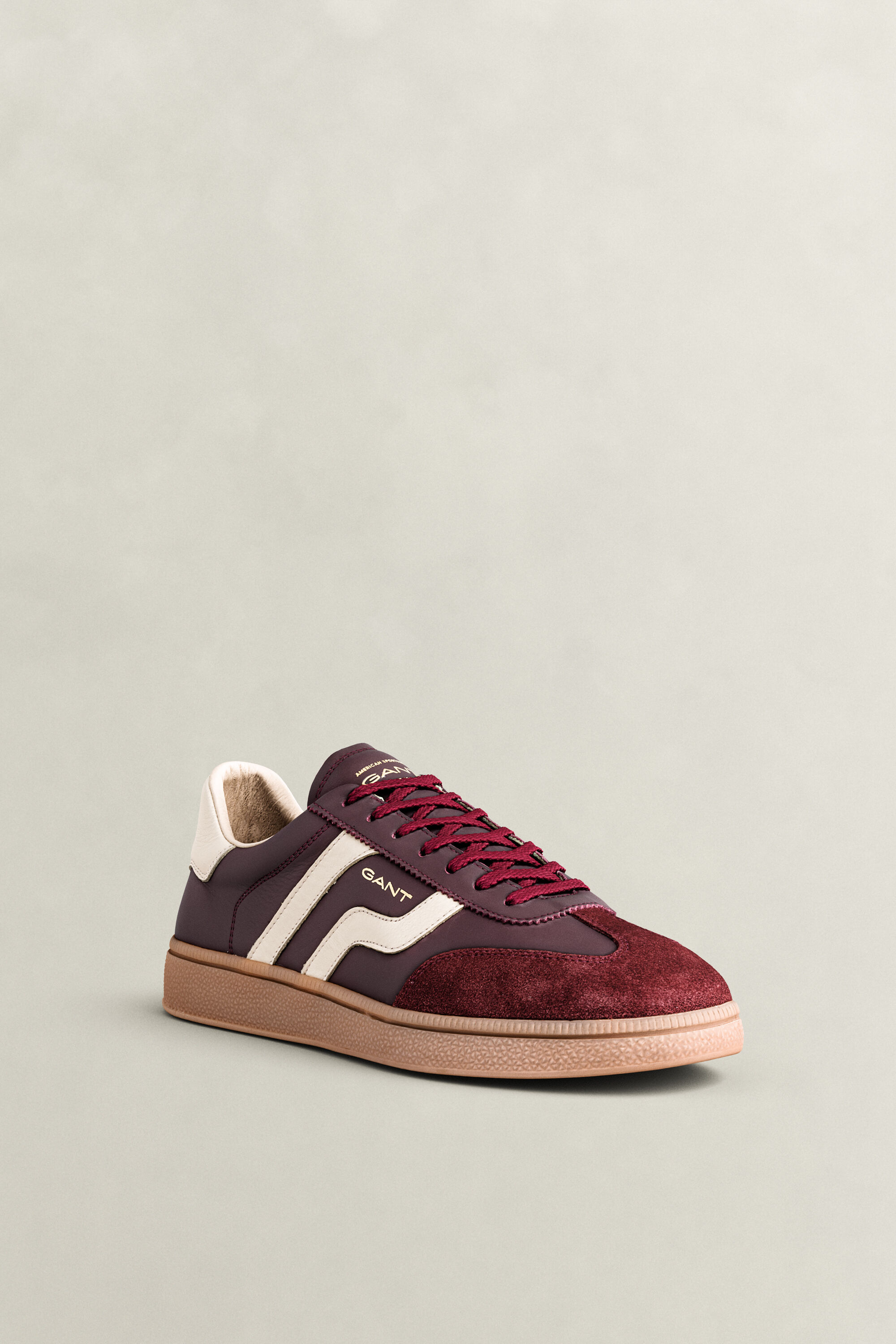 Cuzmo sneakers i läder och mocka