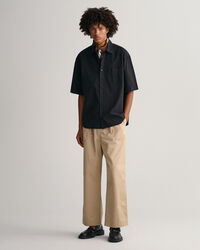 Oversized, solblekt kort&auml;rmad skjorta