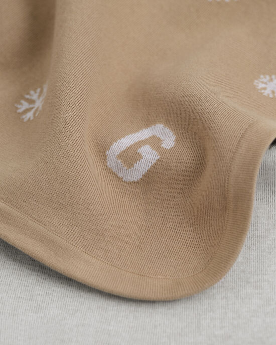 Baby stickad slät med snöflingor och G-mönster