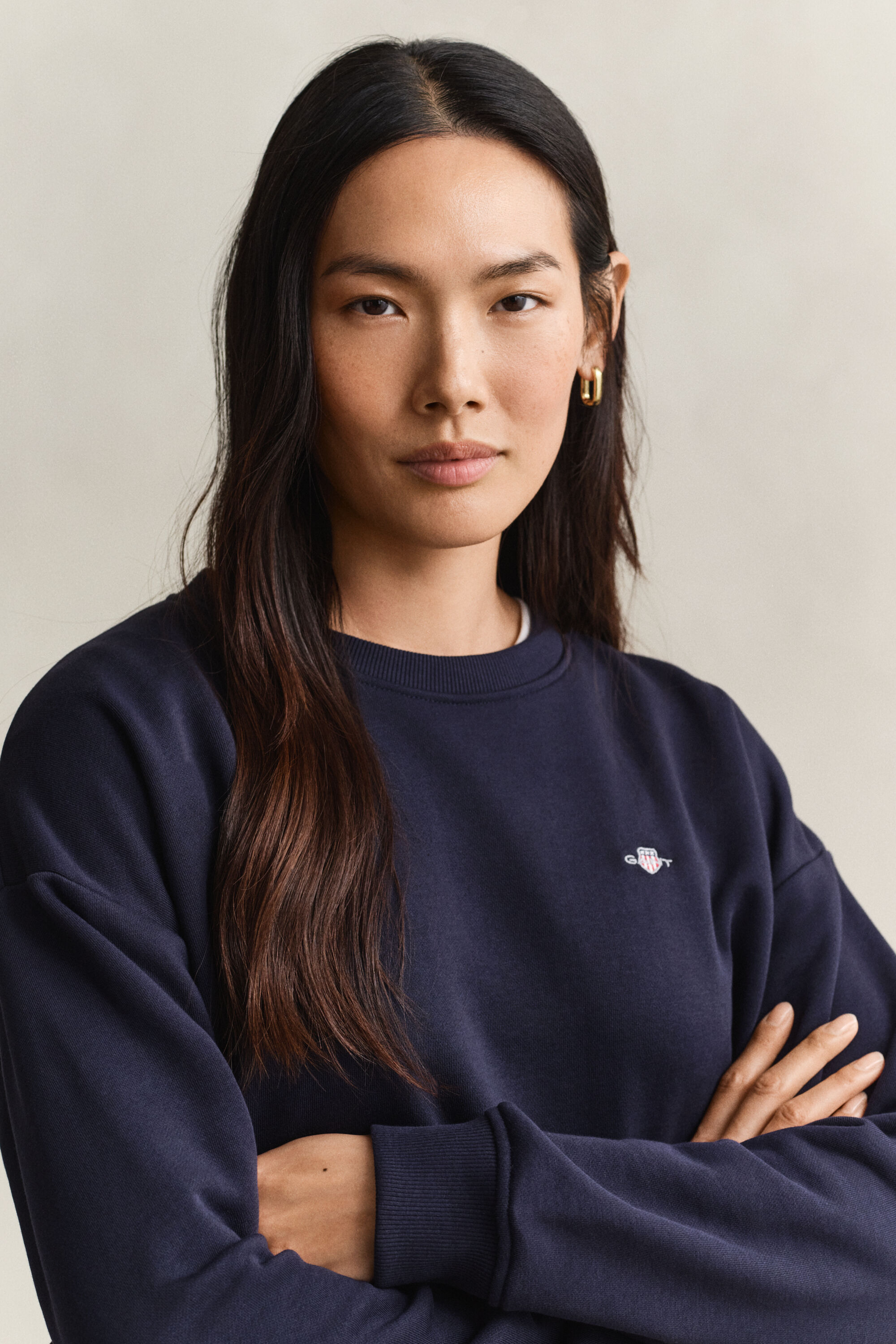 Sweatshirt med sköldemblem