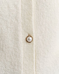 Rundhalsad kofta i bouclé