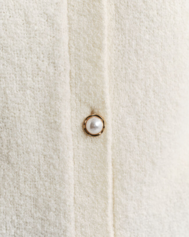 Rundhalsad kofta i bouclé