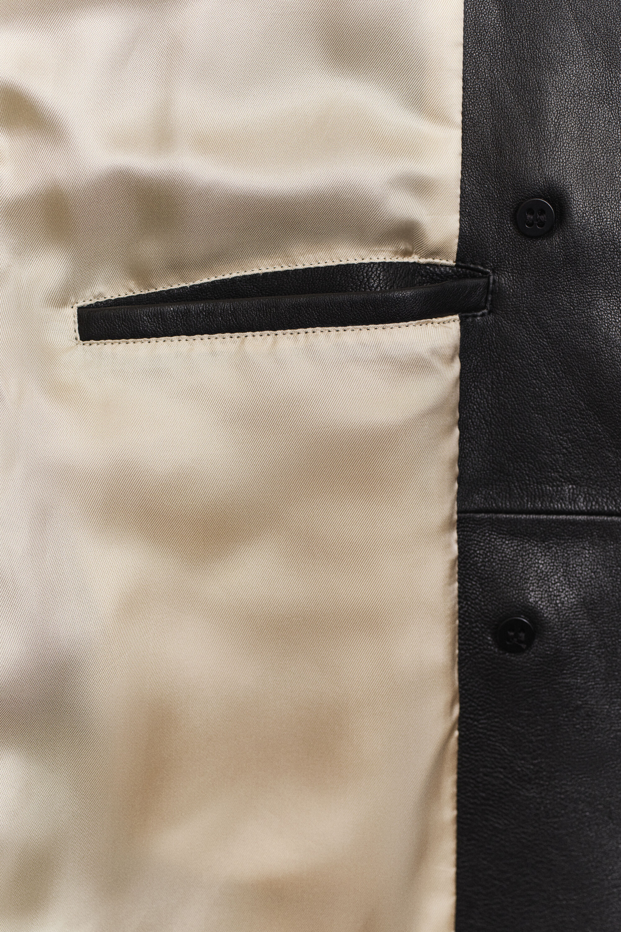 Kort trenchcoat i läder