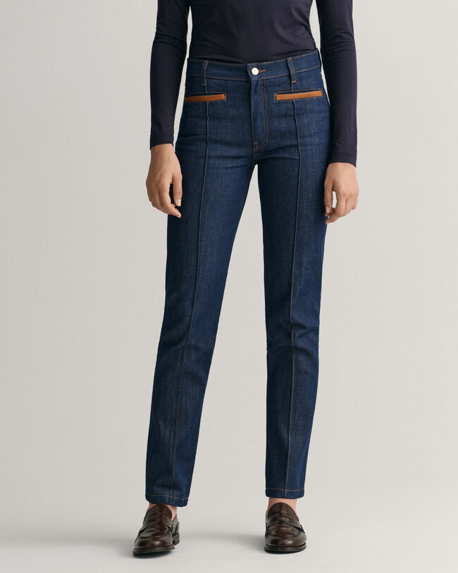 Slim fit jeans med skinndetaljer