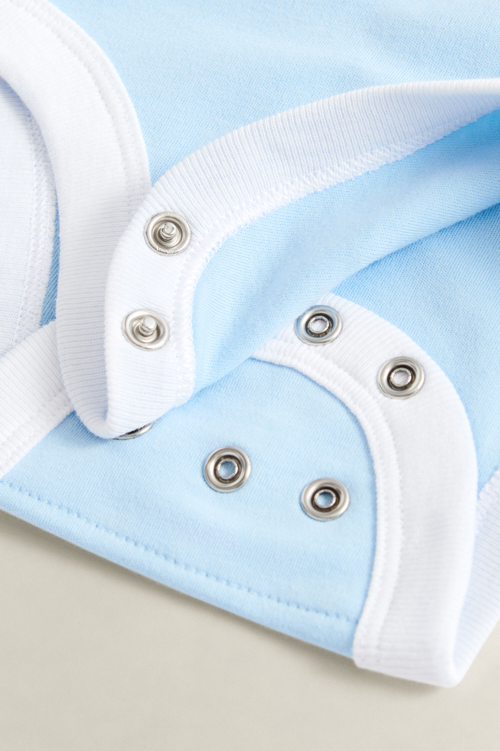 Baby set med sparkdräkt och mössa