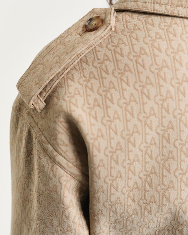 Trenchcoat i jacquard med monogram