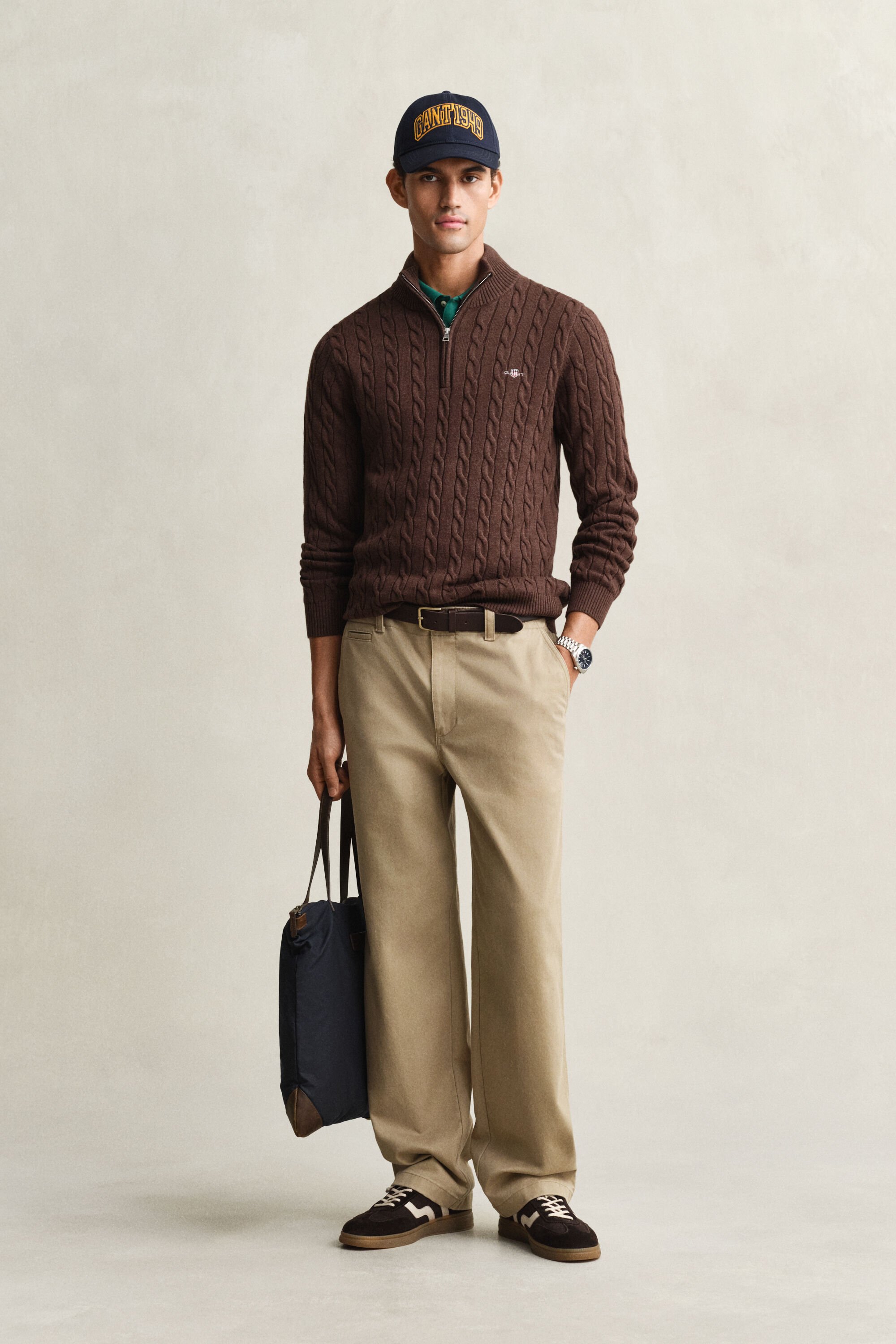 Kabelstickad bomullströja med dragkedja vid halsöppningen